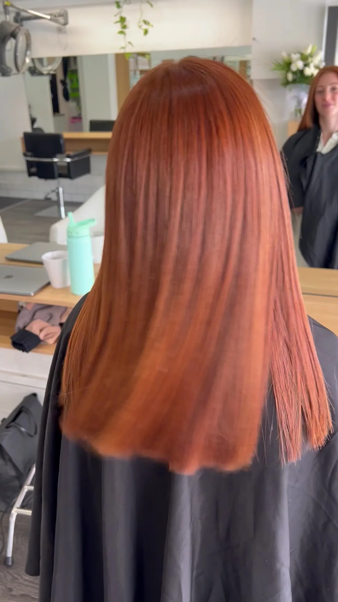 Copper-red glossy straight hair, back view
